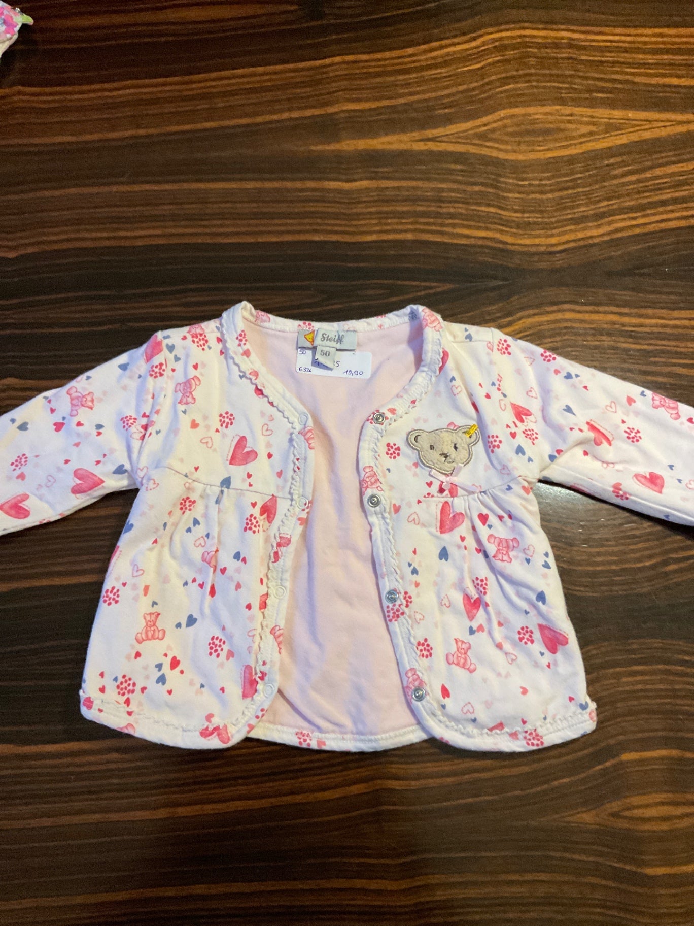 Steiff Jacke 50 rosa und roten Mustern